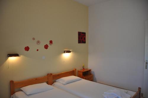 En eller flere senger på et rom på Villa Vasiliki