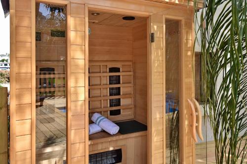 a sauna in a house with a plant at וילה גאיה בכנרת-VIILA GAYA in Migdal