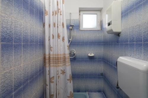 Koupelna v ubytování A1 - apt near beach with patio parking and grill