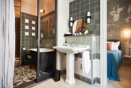 Salle de bains dans l'établissement Cora Apartments