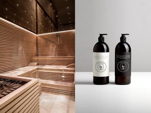two bottles of wine sitting next to each other at GEBHARD Boutique B&B inklusive Sommercard in Fiss