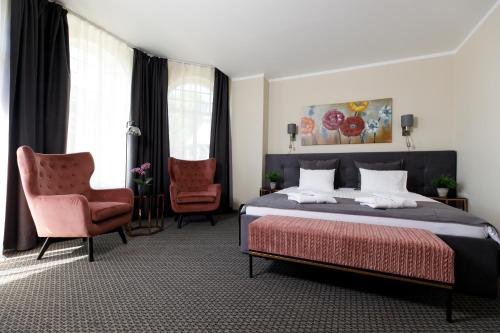Postel nebo postele na pokoji v ubytování Spa Hotel Ezeri