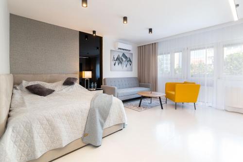 Ένα ή περισσότερα κρεβάτια σε δωμάτιο στο Studio Silesian Vip City Centrum Free Parking