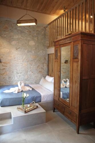 Ένα ή περισσότερα κρεβάτια σε δωμάτιο στο Laini Guest Houses