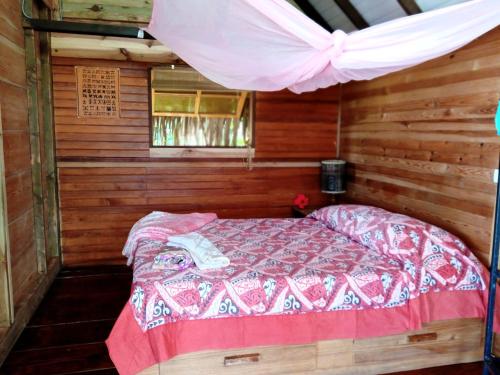 Ένα ή περισσότερα κρεβάτια σε δωμάτιο στο Sunset Double rooms - Auberge Polynésienne
