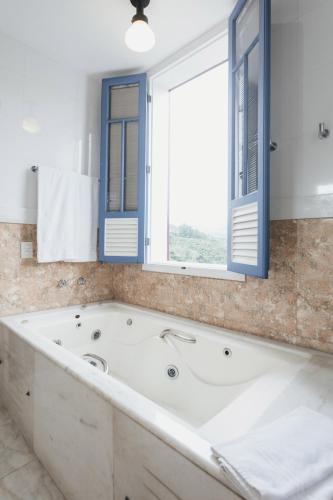 Koupelna v ubytování Hotel Pousada Minas Gerais