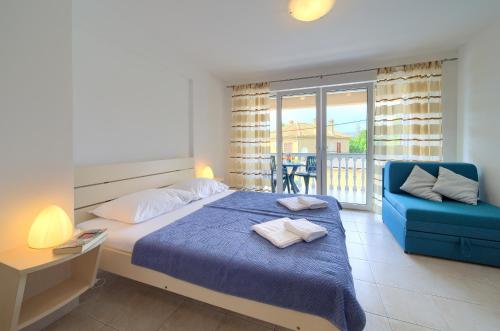 Postel nebo postele na pokoji v ubytování Apartments Ivica Krk Island