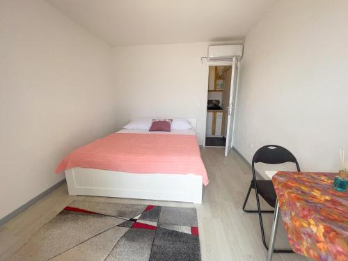 Postel nebo postele na pokoji v ubytování Apartmani Fabijan&Florijan