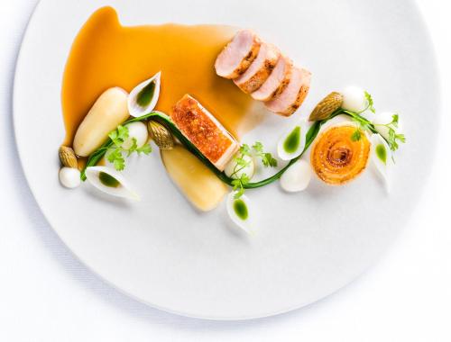 a plate of food on a white plate at Rothay Manor Hotel in Ambleside