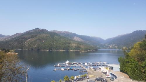 a view of a marina with boats in the water at Sobreiro Apartamentos in Rio Caldo