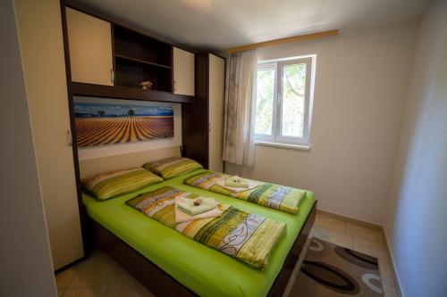 Apartments Pavic tesisinde bir odada yatak veya yataklar