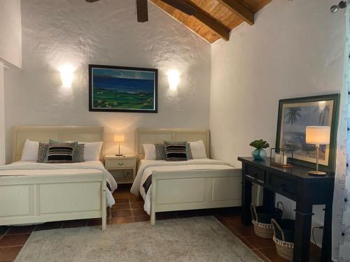 Ένα ή περισσότερα κρεβάτια σε δωμάτιο στο Lux Villa Casa de Campo