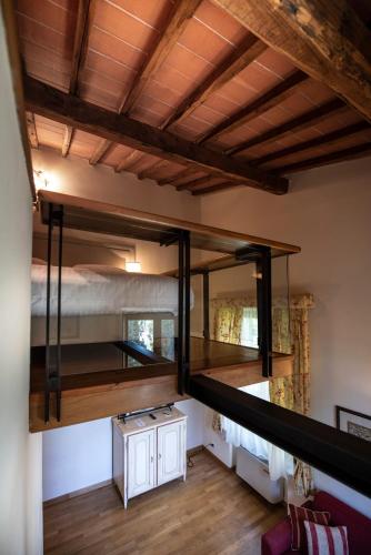 a room with two bunk beds in a house at Villa Scacciapensieri Boutique Hotel in Siena
