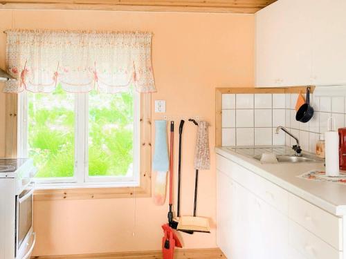 Kuhinja oz. manjša kuhinja v nastanitvi Two-Bedroom Holiday home in Braås