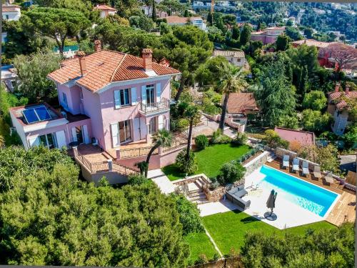 an aerial view of a house with a swimming pool at Stunning seaview villa. Villefranche Sur Mer in Villefranche-sur-Mer