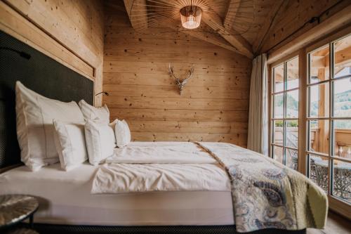 Una cama o camas en una habitación de Chalet Watzmann