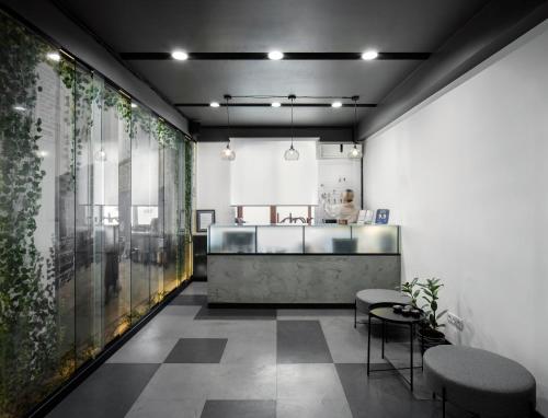 a kitchen with a table and chairs in a room at Kantar Hostel in Yerevan