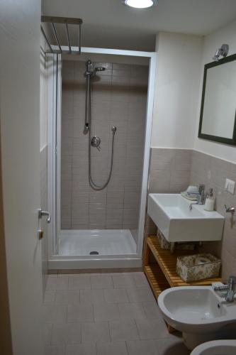 a bathroom with a shower and a sink at Monaciello in Naples
