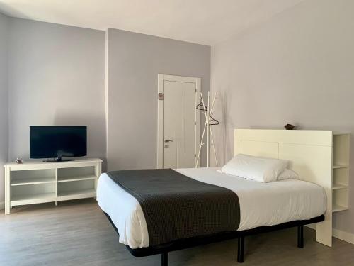 Postel nebo postele na pokoji v ubytování Hostal I Dream Salamanca