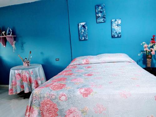 Hostal Solsticio Guajiroにあるベッド
