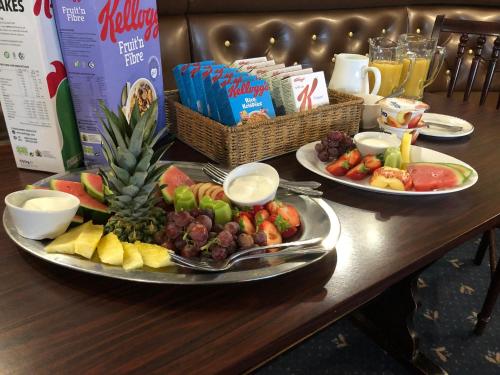 a table with two plates of food on it at The Aberdeen Arms Hotel in Tarves