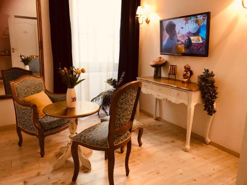 TV a/nebo společenská místnost v ubytování Bed&Breakfast Andio
