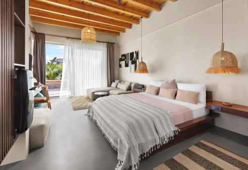 Postel nebo postele na pokoji v ubytování Kaipo Alaçatı Adult Only