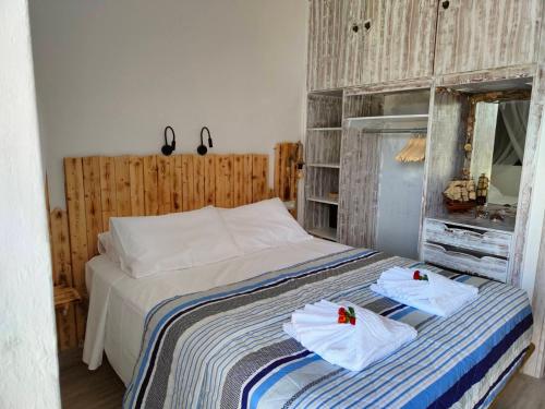 Postel nebo postele na pokoji v ubytování Sea Sound Haraki apartment