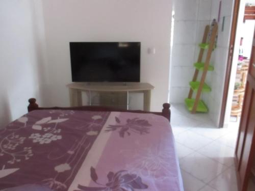 TV a/nebo společenská místnost v ubytování Bien ventilé