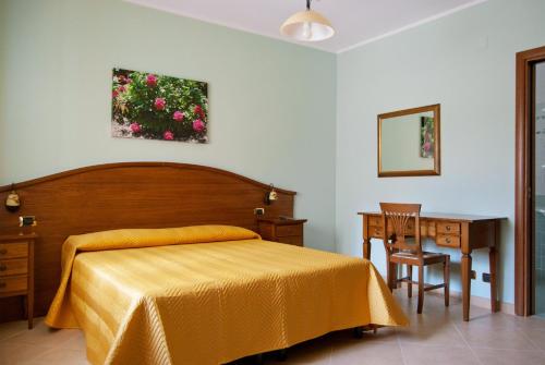 Postel nebo postele na pokoji v ubytování B&B Angela