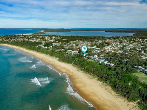 an aerial view of a beach and the ocean at Surfspray I Pet Friendly I Absolute Beachfront in Culburra Beach