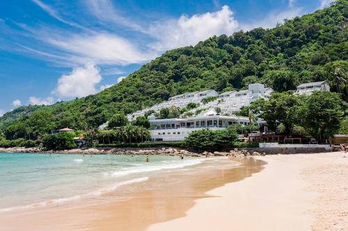 a view of a beach with a hotel at The Nai Harn in Nai Harn Beach