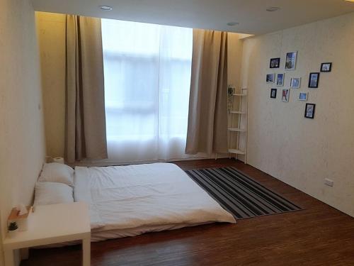 Кровать или кровати в номере 光鹿旅人短期月租出租