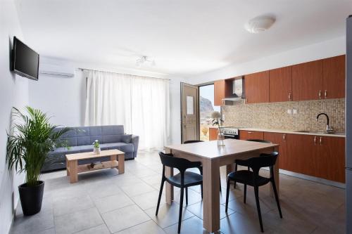 Η κουζίνα ή μικρή κουζίνα στο Tulipa Suites