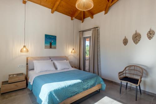 Postel nebo postele na pokoji v ubytování Tierra Olivo Villas