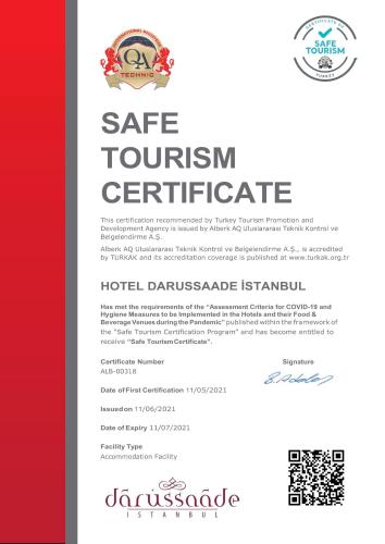 伊斯坦布尔Darussaade Hotel Old City - Sultanahmet的一份带有红白相间图案的安全旅游证书