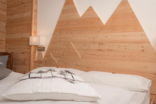 Cama o camas de una habitación en Garni Le Prealpi