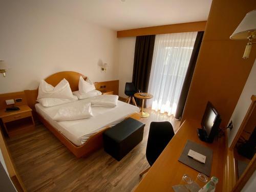 Postel nebo postele na pokoji v ubytování Hotel Simpaty