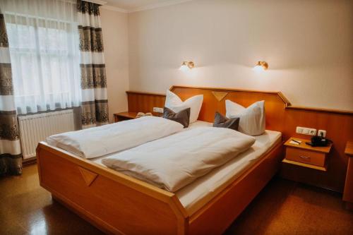 מיטה או מיטות בחדר ב-App.-Haus zur Europa-Therme