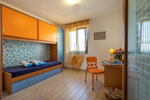 Ένα ή περισσότερα κρεβάτια σε δωμάτιο στο Casa vacanze Sardegna il Corbezzolo