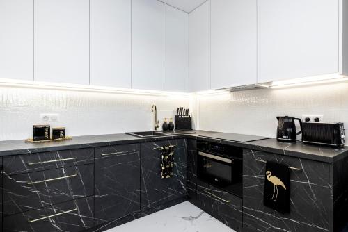 Dapur atau dapur kecil di Natural Darłówko Emilia Strupiechowska