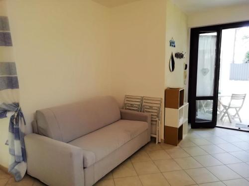 Coin salon dans l'établissement Centralissimo appartamento a Numana