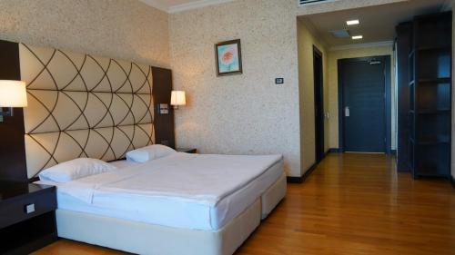 Postel nebo postele na pokoji v ubytování Agsaray Deluxe Hotel & SPA