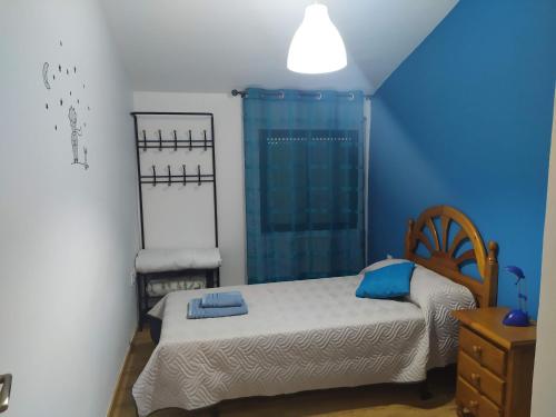 Postel nebo postele na pokoji v ubytování Vienda de Uso Turístico Ramos 1