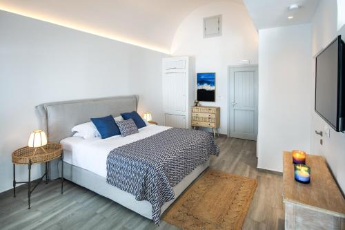 Ένα ή περισσότερα κρεβάτια σε δωμάτιο στο Siete Mares Luxury Suites
