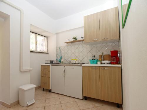 Kuchyň nebo kuchyňský kout v ubytování Apartments Klaudio 1318