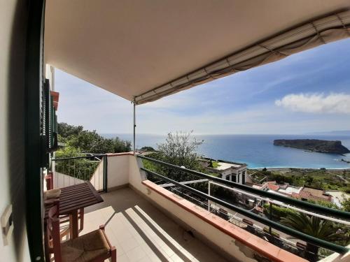 a balcony with a view of the ocean at Arcomagno Guest House in San Nicola Arcella