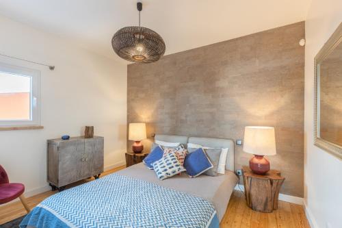 Ένα ή περισσότερα κρεβάτια σε δωμάτιο στο Ericeira Ocean View Villa