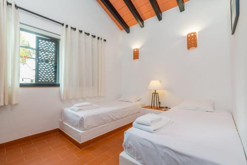 Ένα ή περισσότερα κρεβάτια σε δωμάτιο στο Terrace Villa 19B