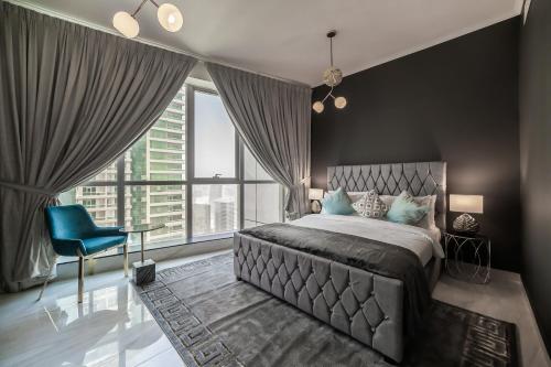 Lova arba lovos apgyvendinimo įstaigoje HiGuests - Luxury Apartment, 10-min Walk to Dubai Harbor